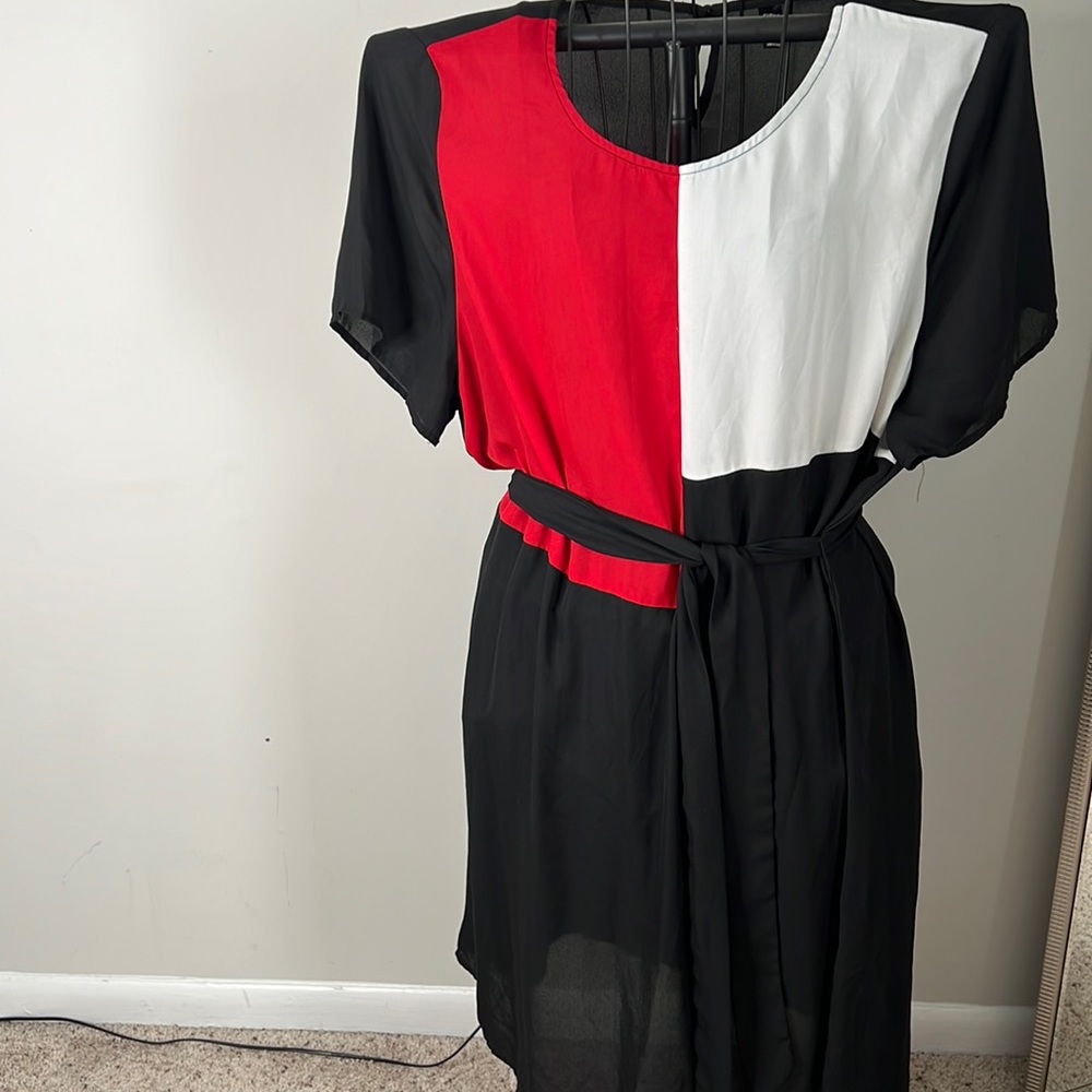 Sheer black dress with belt